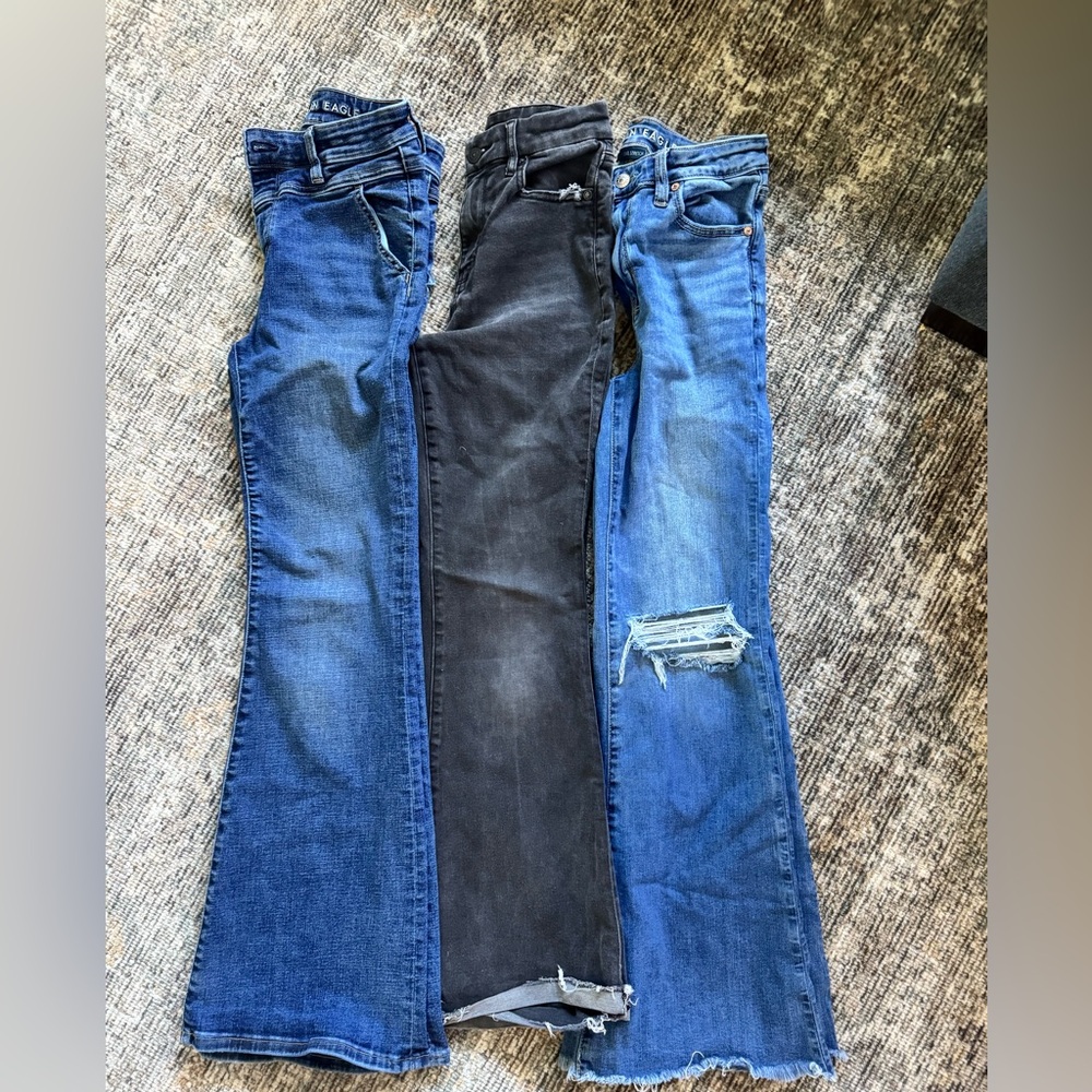 American Eagle Outfitters Flare Jeans Trio in Dark Blue, Black, and Light Blue